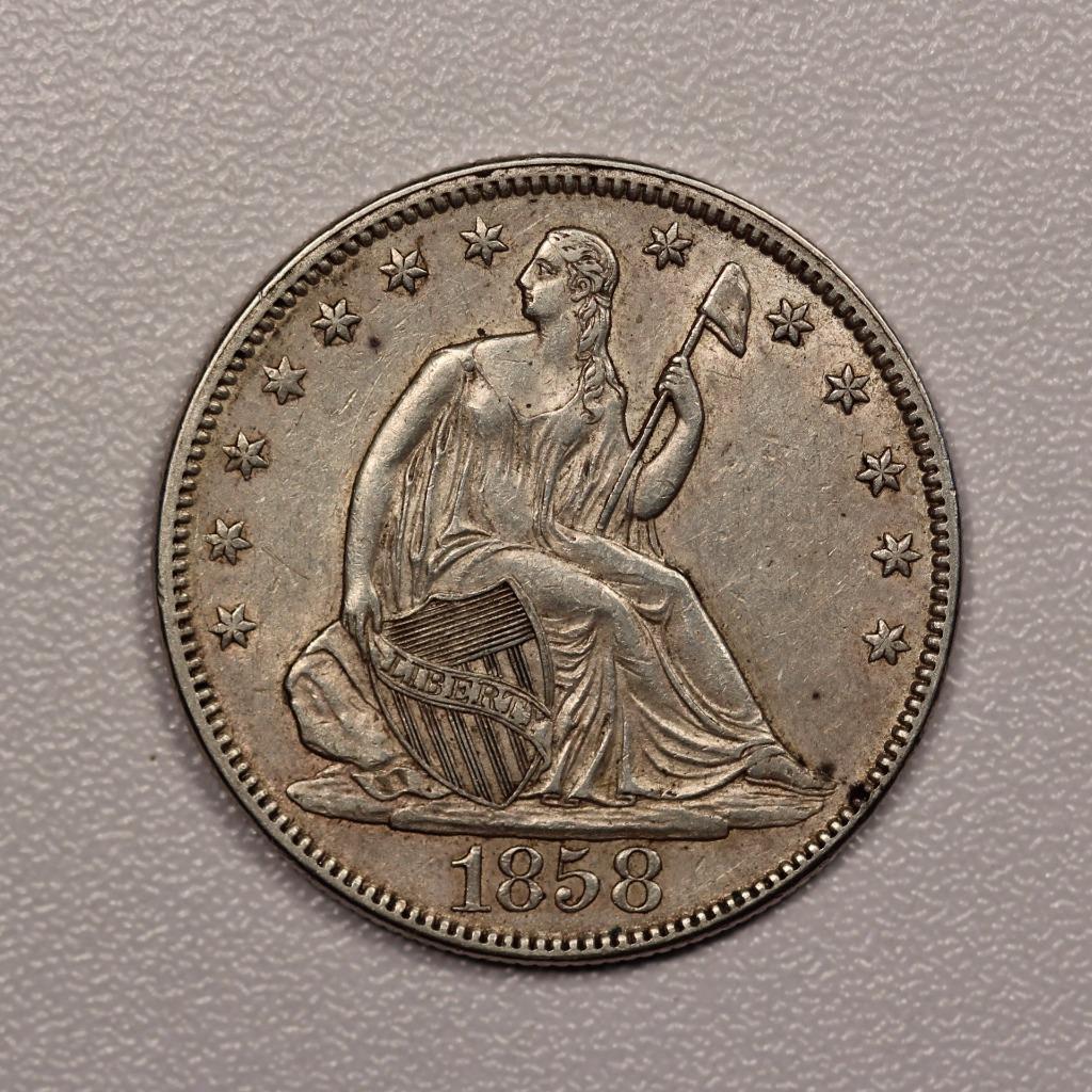 1858 Seated Liberty Half Dollar AU-50 | Of Coins & Crystals