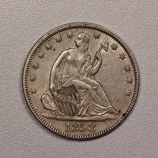 1858 Seated Liberty Half Dollar AU-50 | Of Coins & Crystals