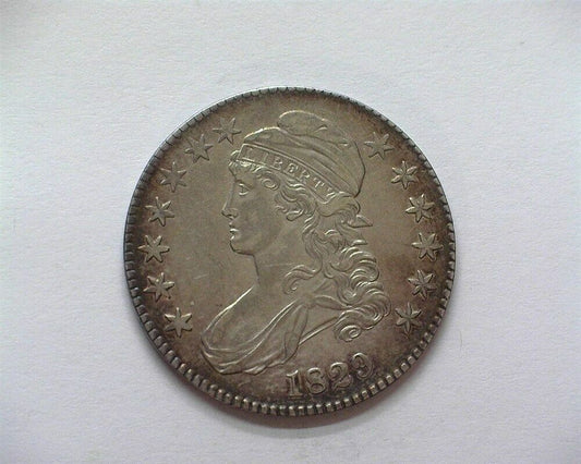 1829 Capped Bust Half Dollar AU-50 | Of Coins & Crystals