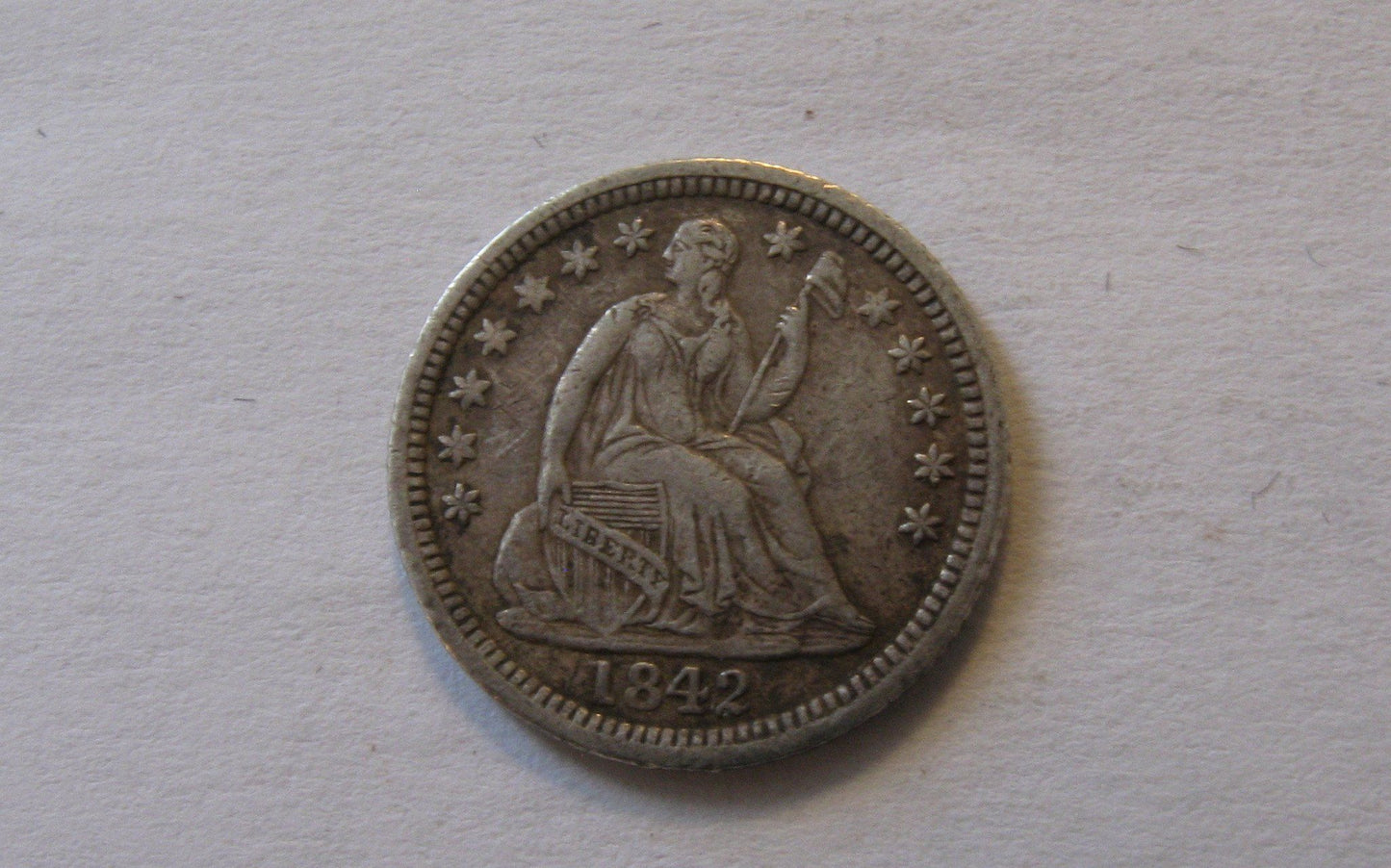 1842 O  Seated Liberty Half Dime. XF-40 | Of Coins & Crystals