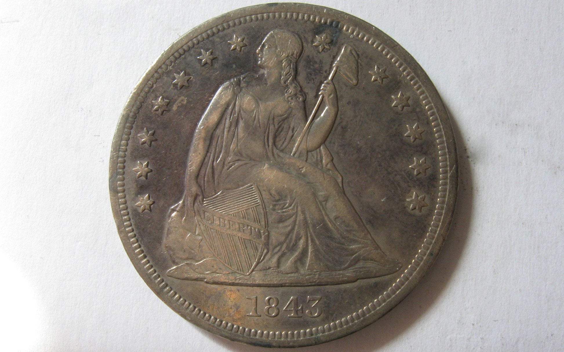 1843 Seated Liberty Dollar  XF-45 | Of Coins & Crystals