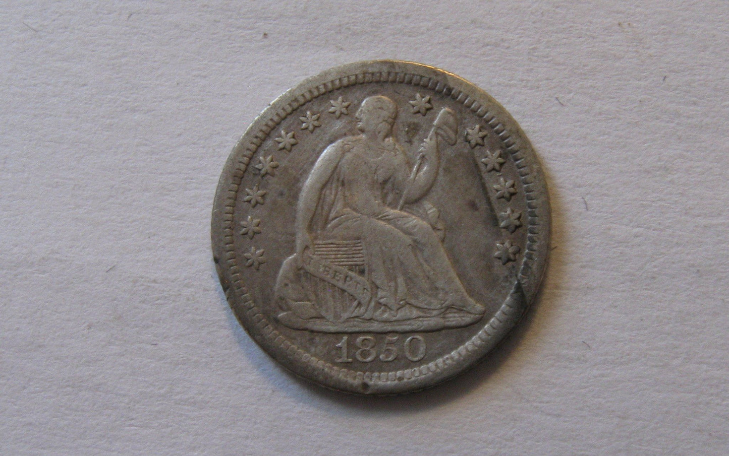 1850 O Seated Liberty Half Dime.  VF-20 | Of Coins & Crystals