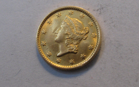 1854 Liberty Head Gold Dollar.  MS-62 | Of Coins & Crystals