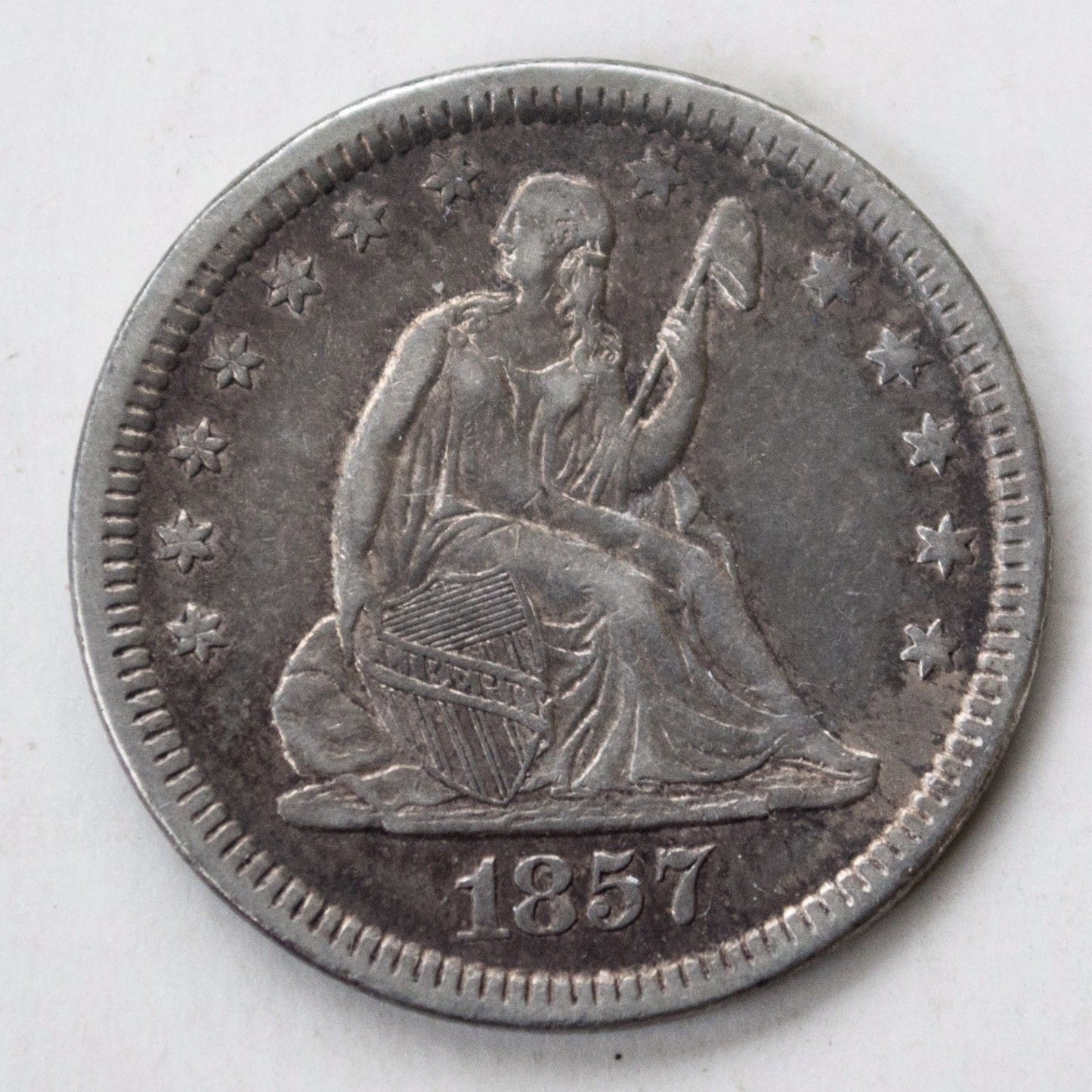 1857 Seated Liberty Quarter AU50 | Of Coins & Crystals