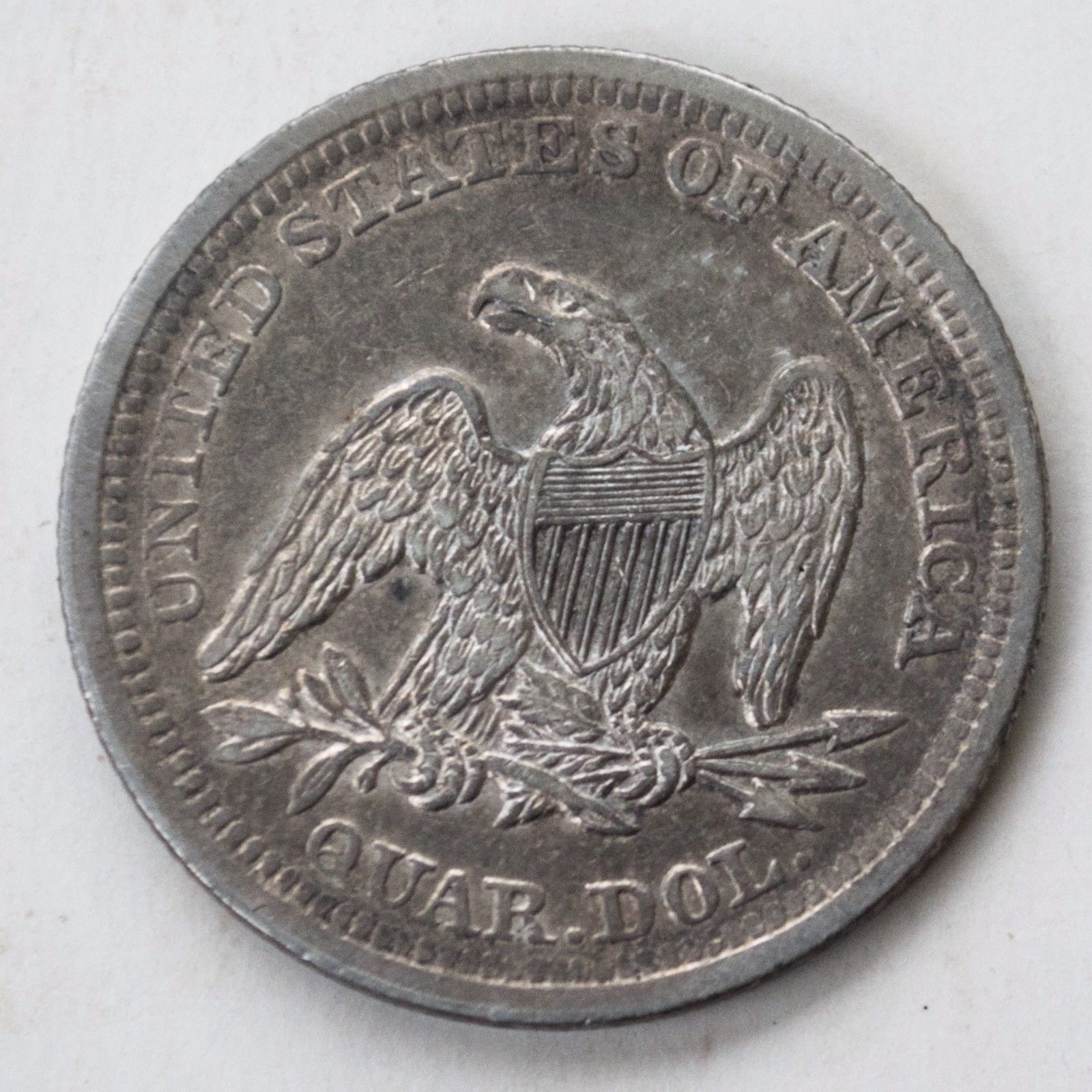 1857 Seated Liberty Quarter AU50 | Of Coins & Crystals
