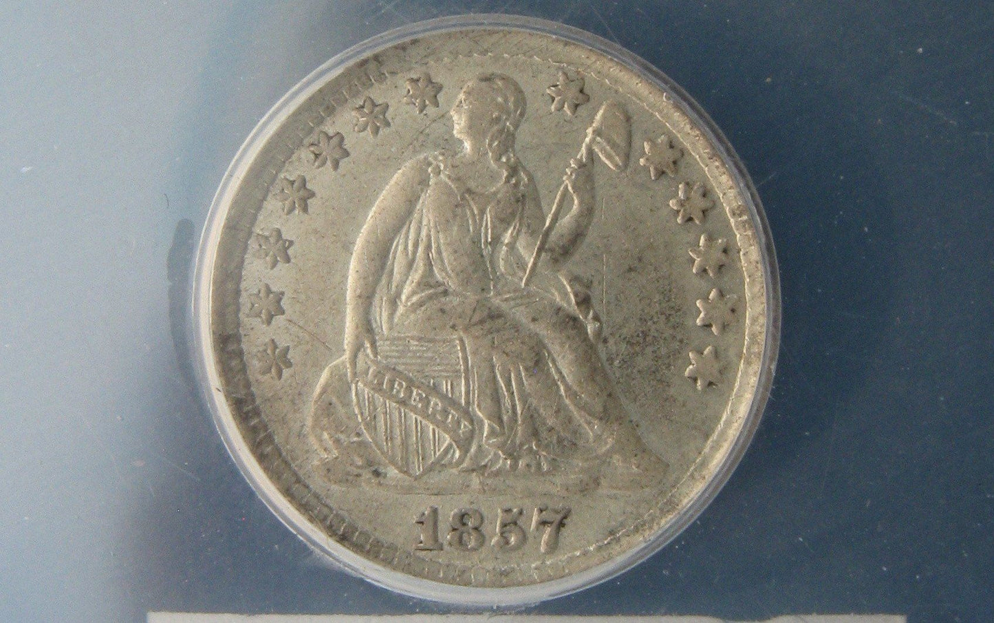 1857 Seated Liberty Half Dime.   ANACS AU-50 | Of Coins & Crystals