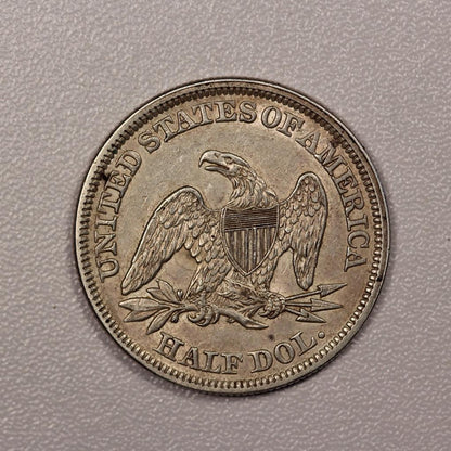 1858 Seated Liberty Half Dollar AU-50 | Of Coins & Crystals