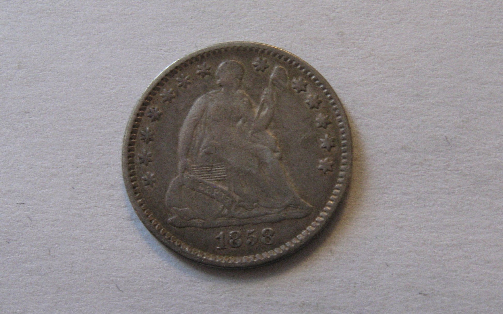 1858 Seated Liberty Half Dime.  XF-40 | Of Coins & Crystals