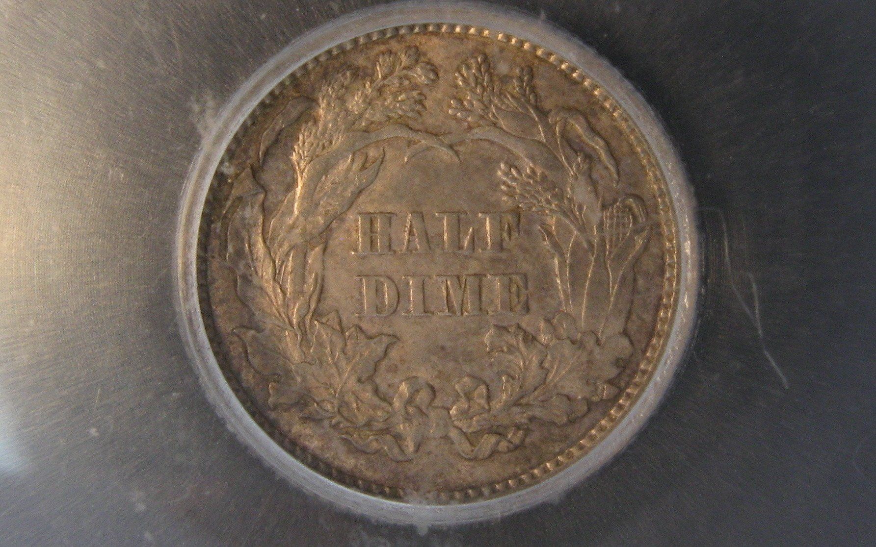 1870 Seated Liberty Half Dime.  ICG AU-55 | Of Coins & Crystals