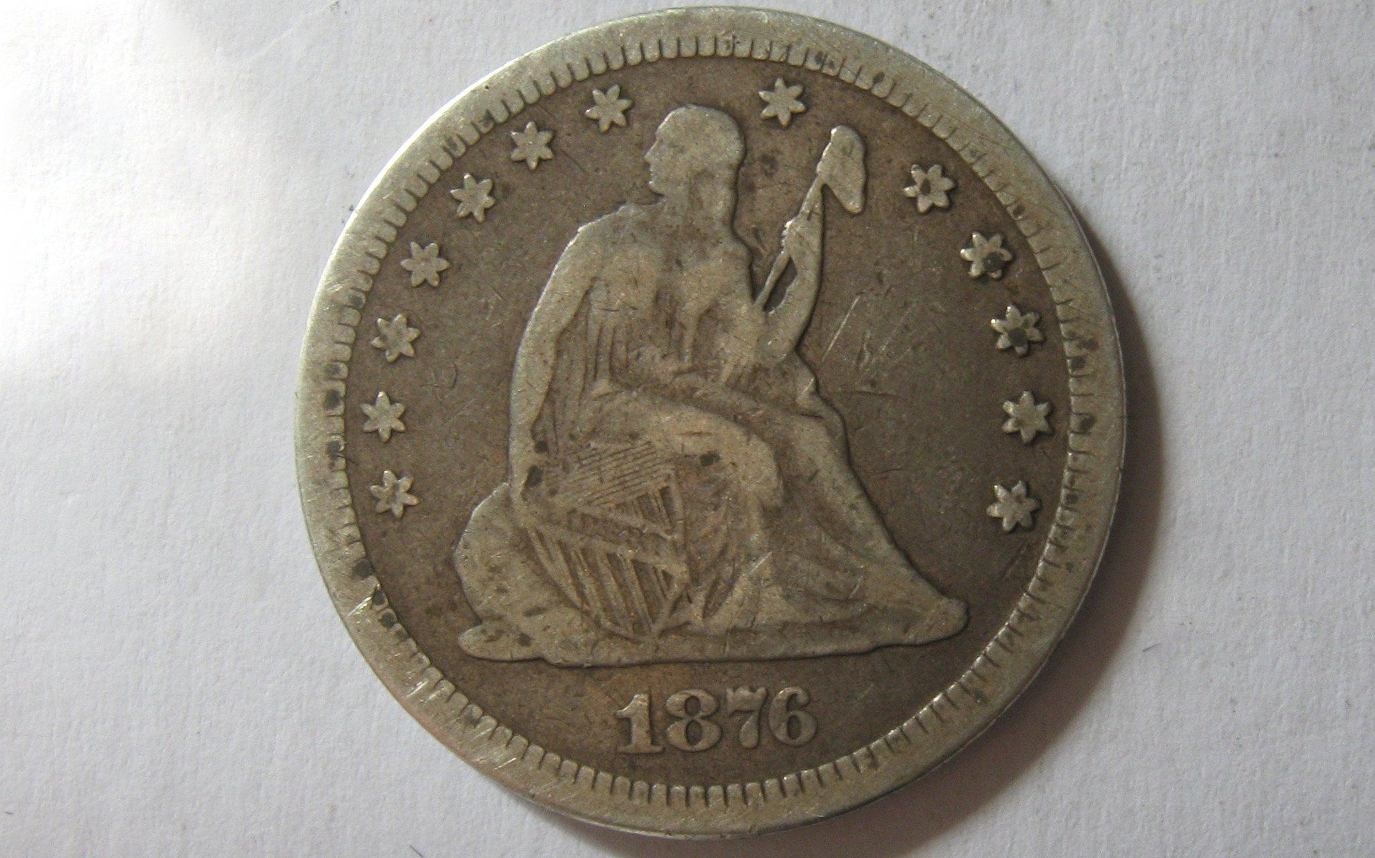 1876-CC Seated Liberty Quarter. F-12 | Of Coins & Crystals