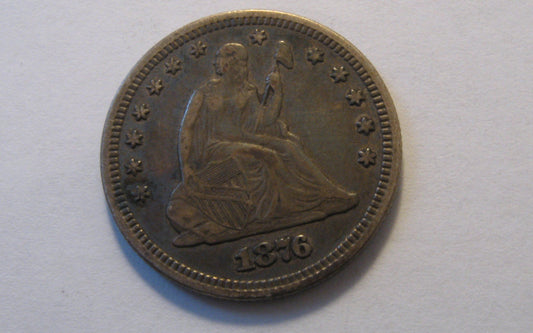 1876 Seated Liberty Quarter.  XF-45 | Of Coins & Crystals