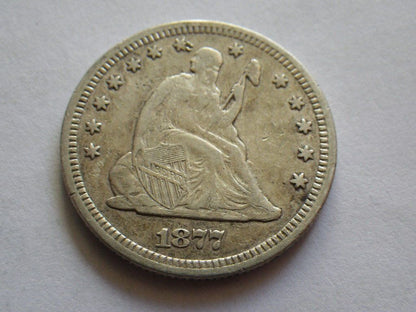 1877 Seated Liberty Quarter VF-30 | Of Coins & Crystals