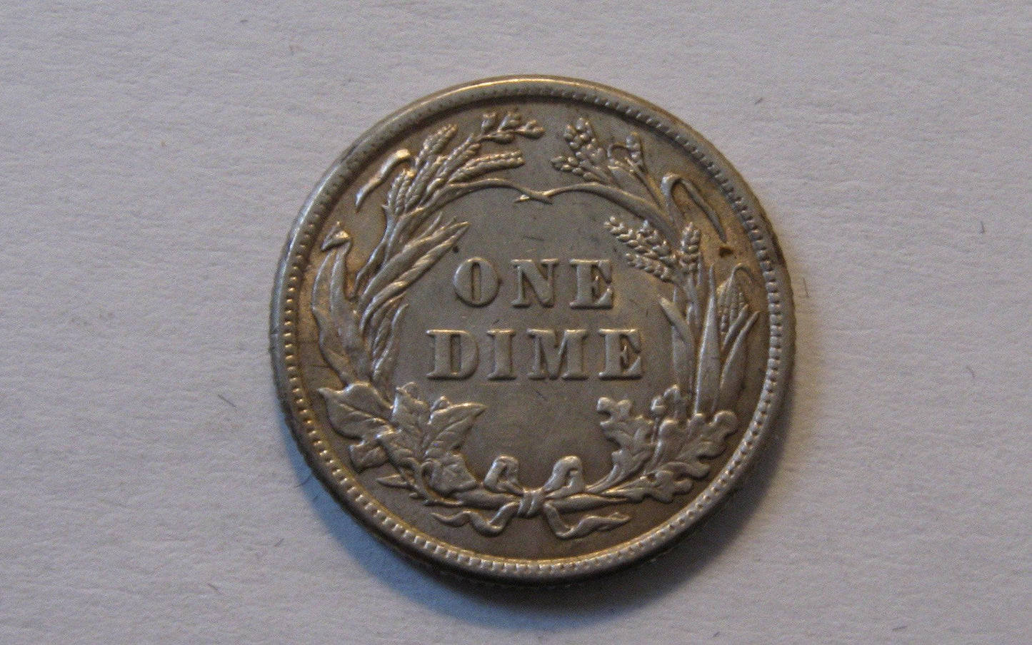 1913 Barber Dime.  AU-50 | Of Coins & Crystals