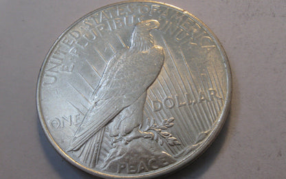 1927-D Peace Dollar.  AU-55 | Of Coins & Crystals