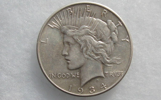 1934  Peace Dollar AU-55 | Of Coins & Crystals