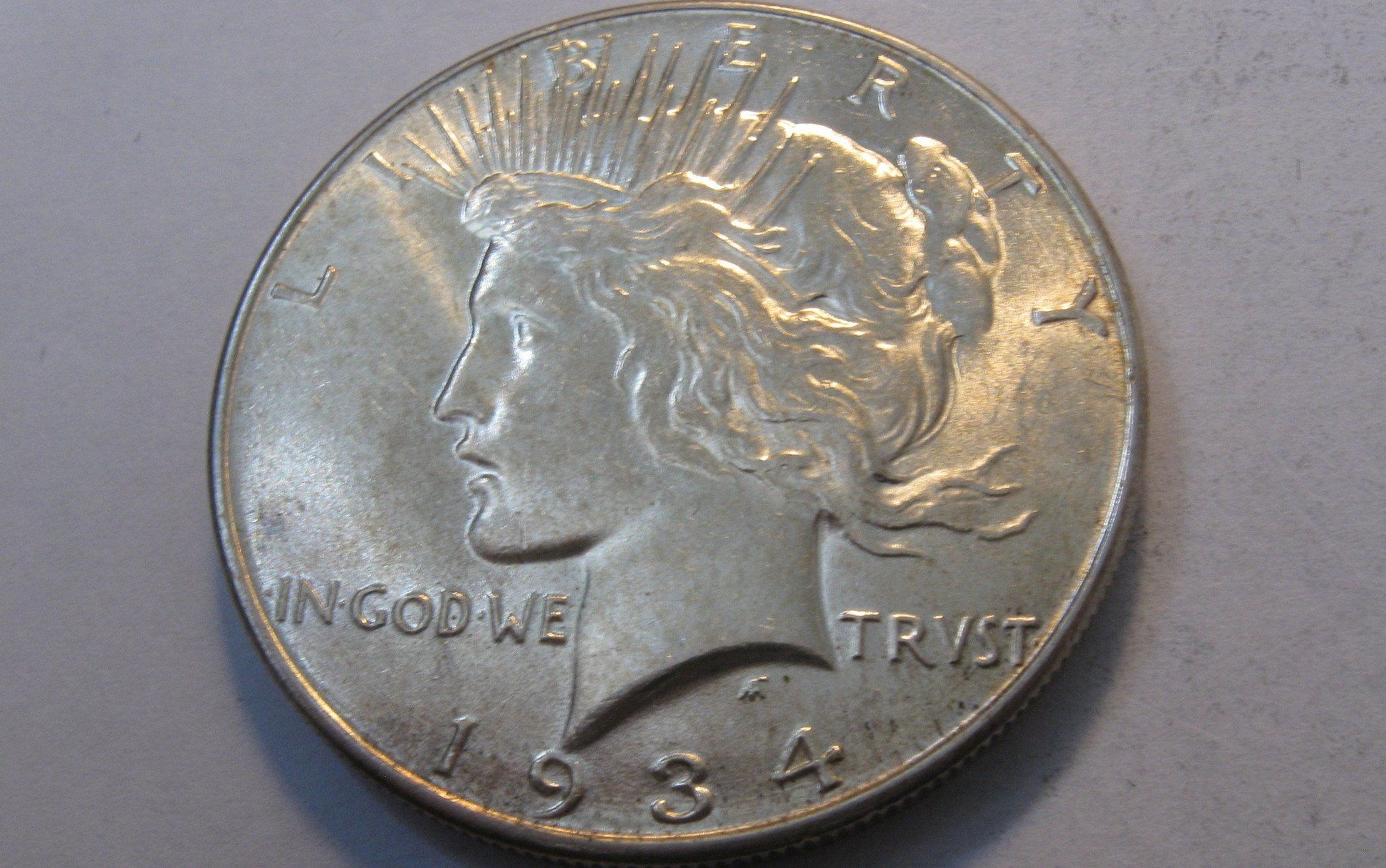 1934 Peace Dollar. MS-61 | Of Coins & Crystals