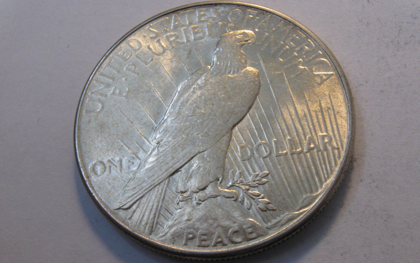 1934 Peace Dollar. MS-61 | Of Coins & Crystals